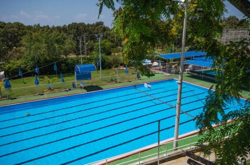 수영장, Travel Hotel Gesher Haziv in 나하리야