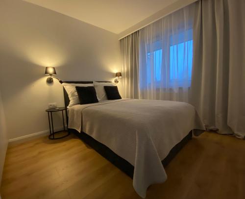 Apartament Dekerta garaż, duży taras, smart tv