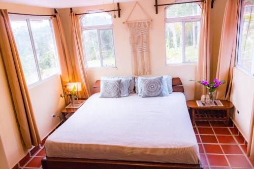 Villa La Vista of Panama City and magestical mountains from infinity pool in Cerro Azul