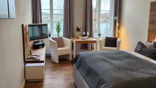 Das Ferienapartment Alexandrine direkt am Pfaffenteich, mitten im Herzen von Schwerin