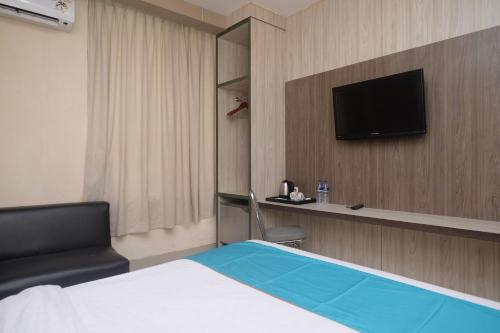 Photo - Sans Hotel Lynt Makassar