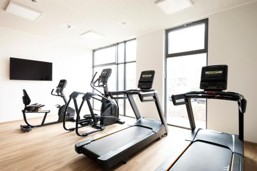 Fitness center, LOGINN Hotel Berlin Airport in Airport Berlin-Schonefeld