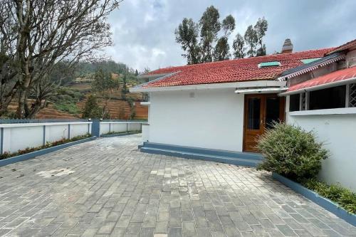 Hotel Pentoz Bellevue Cottage, Ooty