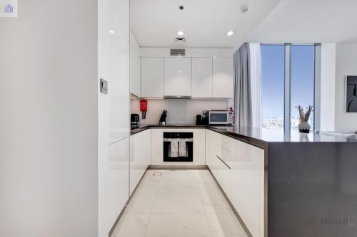 Spacious waterfront 1 BR at MBR city - image 2