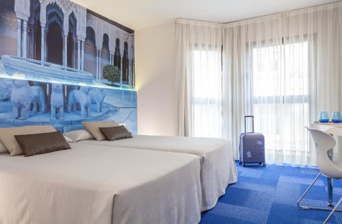 Hotel Maciá Granada Five Senses Rooms & Suites - image 4