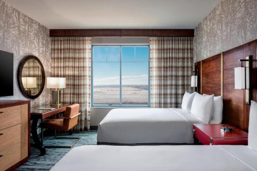 Guest Room with Two Queen Beds and Partial View