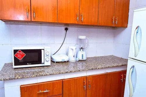 кухня, Lux Suites Milimani Business Apartments Nakuru in Накуру