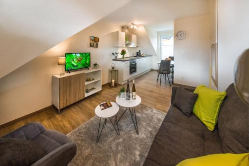 صالة مشتركة/ منطقة التلفزيون, Ferienwohnung Riesling im Weingut Lamm Jung in Eltville am Rhein