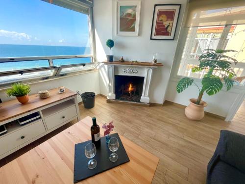 GATU Casa Muse junto a la playa, aire acc, terraza, wifi, netflix, chimenea