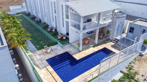 Triplex com Jacuzzi em Porto das Dunas por Carpediem