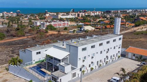 Triplex com Jacuzzi em Porto das Dunas por Carpediem