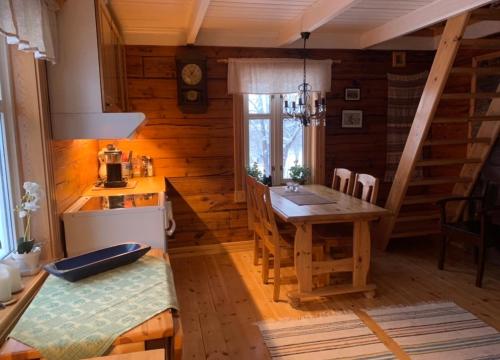 100 Years Old Norwegian Log House in Tromsø in Kvaloysletta