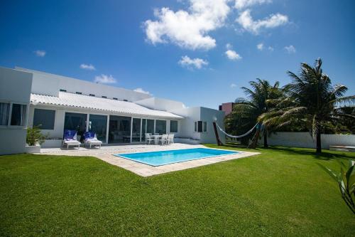 Casa Incrível na Praia de Jacumã por Carpediem