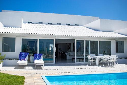 Casa Incrível na Praia de Jacumã por Carpediem