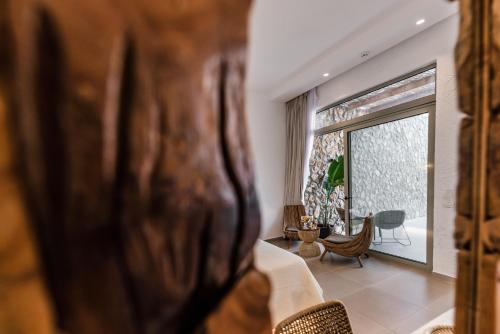 Delfini Beach Hotel & Suites Delfini Beach Hotel & Suites