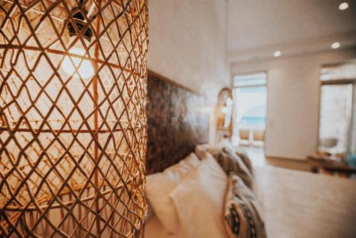 Delfini Beach Hotel & Suites Delfini Beach Hotel & Suites