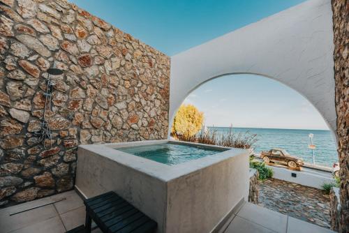 Delfini Beach Hotel & Suites Delfini Beach Hotel & Suites