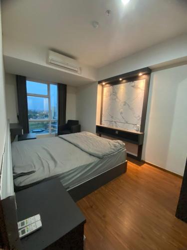 Spacious Apartment at Grand Lagoon Sungkono