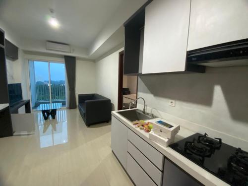 Spacious Apartment at Grand Lagoon Sungkono