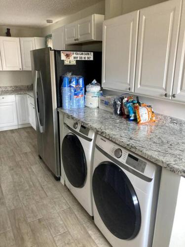 Very Private 3 Bed Home with HEATED Pool Palms and Big Fenced Yard in Myrtle Grove