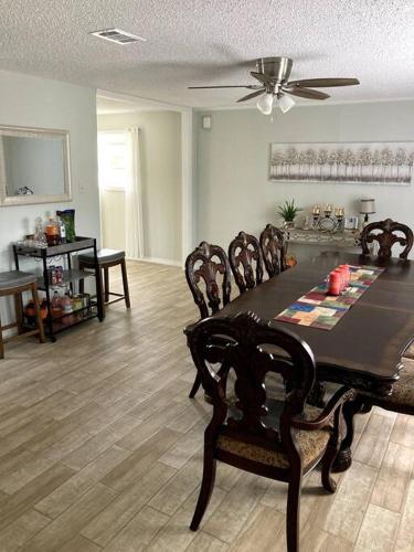 Very Private 3 Bed Home with HEATED Pool Palms and Big Fenced Yard in Myrtle Grove