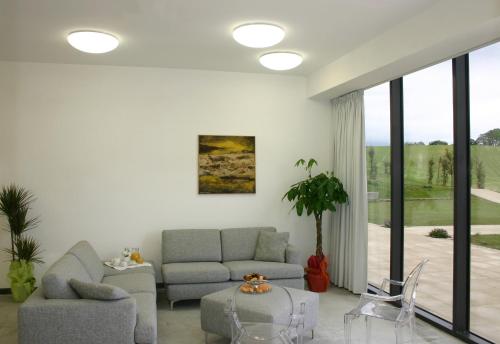 Koplietošanas atpūtas telpa ar TV, Relais Villa D'Assio in Le Case (Lazio)