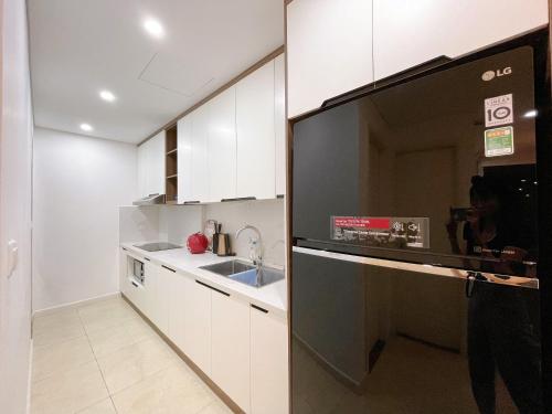 Homestay Vinhomes Dcapital 119 Tran Duy Hung  - 주방
