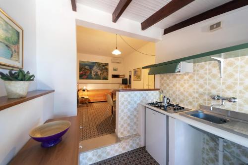 köök, Gavila's Residenza Turistico Alberghiera in Porto Azzurro