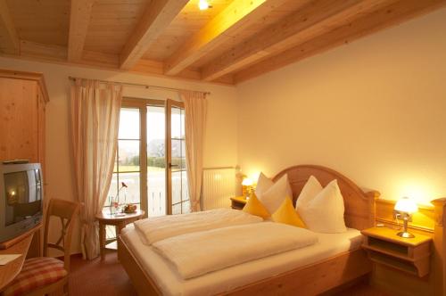 Landhotel Haringerhof mit Saunawelt und Naturbadeteich in 格拉芬豪森