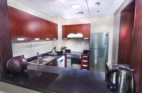 Al Ashrafia Holiday Homes-Sport City The Medalist - image 3