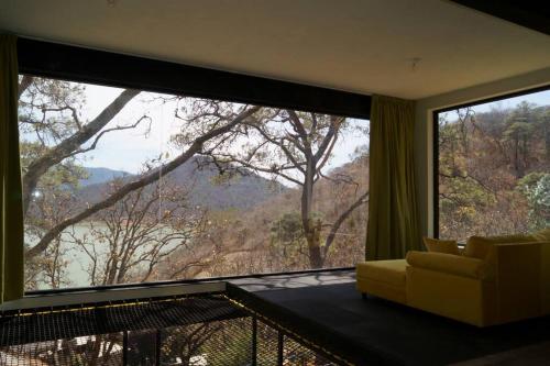 Loft hermoso entre el bosque, vista al Lago.