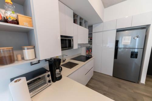 Kitchen, Apartamento moderno 1 habitacion y 1 bano, area Cayala Embajada USA in Zone 16
