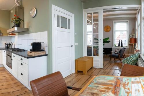  Sfeervol verblijf in oude gemeentehuis Eenrum. in Eenrum