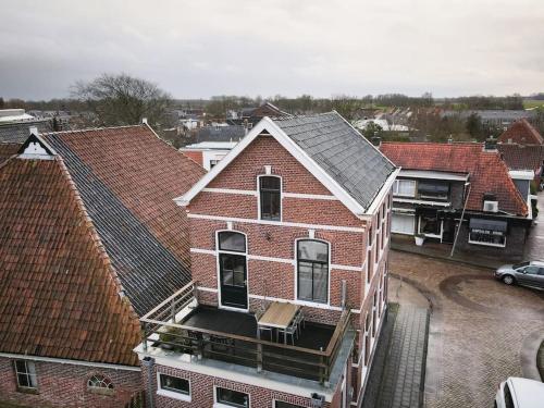 Sfeervol verblijf in oude gemeentehuis Eenrum.