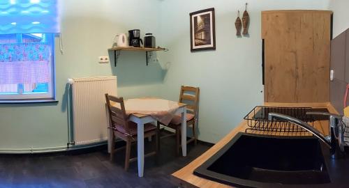 廚房, Ferienwohnung Weseraue in 霍爾茨明登