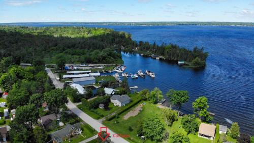 . Fun Place with a Sandy Beach for Swimming, Boating & Fishing, Featuring 1 House and 3 Cabins