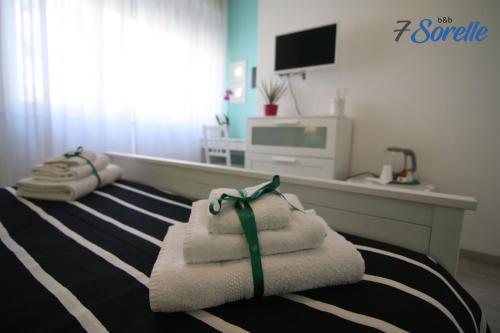 "7 SORELLE B&B" camere in pieno centro città con bagno privato, FREE HIGH SPEED WI-FI, NETFLIX