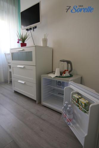 "7 SORELLE B&B" camere in pieno centro città con bagno privato, FREE HIGH SPEED WI-FI, NETFLIX