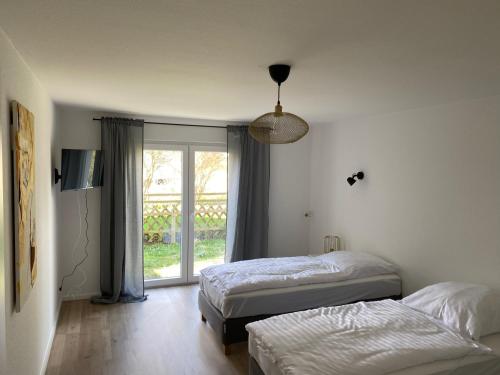 Monteurswohnung mit kleinem Garten 600M zur Stadtmitte - Apartment - Siegen