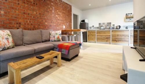 . Lovely new flat near restaurants and beach with solar - free wifi and DSTV