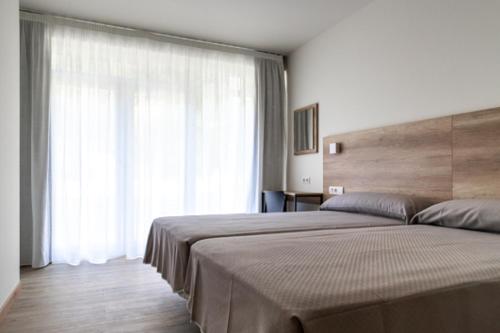 Chambre avec 2 lits, deluxe, balcon