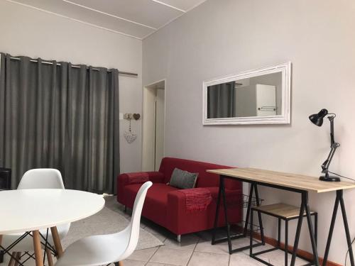 A Touch of Red Room Type - One-Bedroom Apartment
