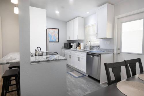 Main Attraction is a Renovated 3 BR Pet Friendly Home with Fenced Yard just Minutes Away From Busch