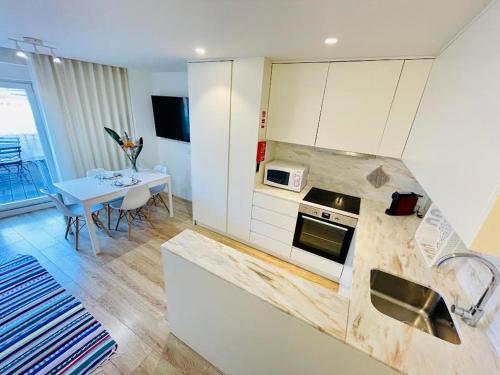 Sweet Apartments Downtown in วิลลา โนวา เดอ ฟามาลิเคา