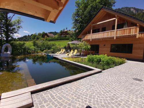 Luxury chalet in Tauplitz Styria with sauna and swimming pond