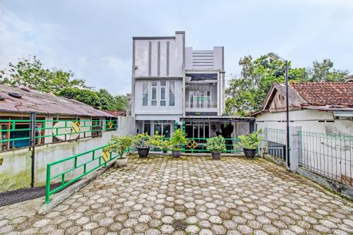 Capital O 92250 Hall & Guesthouse Kowapi Syariah