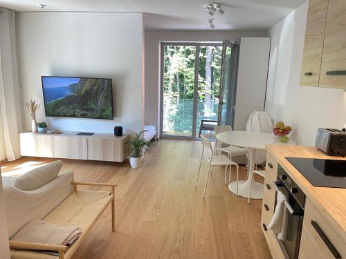 Sunny apartment with forest view