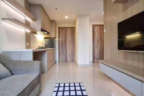 Apt Pejaten Park 1BR Khaki with SmartTv and Pool