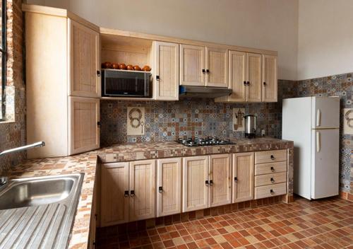 ห้องครัว, Hotel & Temazcal Hacienda Maxtha in ซาน ฮวน เดล ริโอ