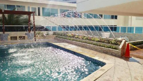 Swimming pool, Cartagena ApartaSuite El Laguito in El Laguito